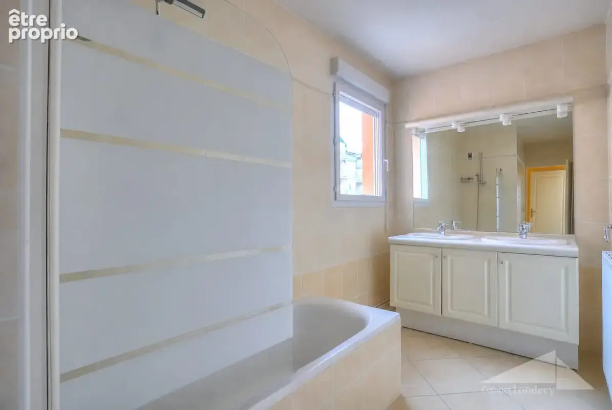 Appartement 4 pièces 126 m² à vendre à Saint-Genis-Pouilly (01630) - photo 9