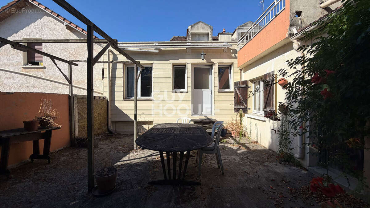 Maison Garges Les Gonesse 4 pièce(s) 120 m2 - photo 11