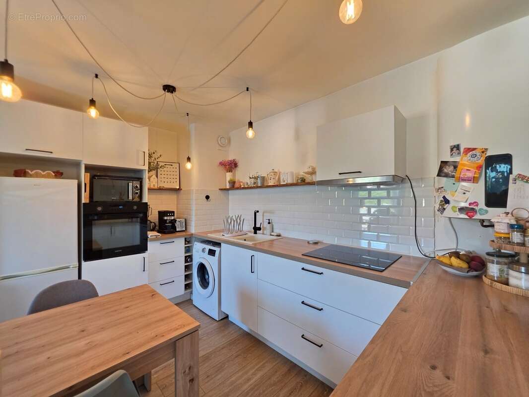 Appartement T2 46m² entièrement rénové, avec parking privatif, à 5min à pied du centre-ville - photo 4