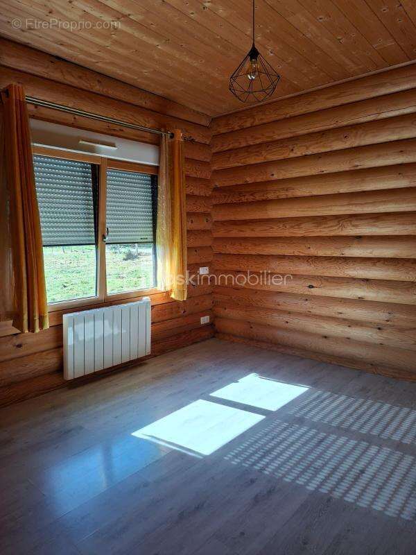 Maison en rondins de bois - photo 10
