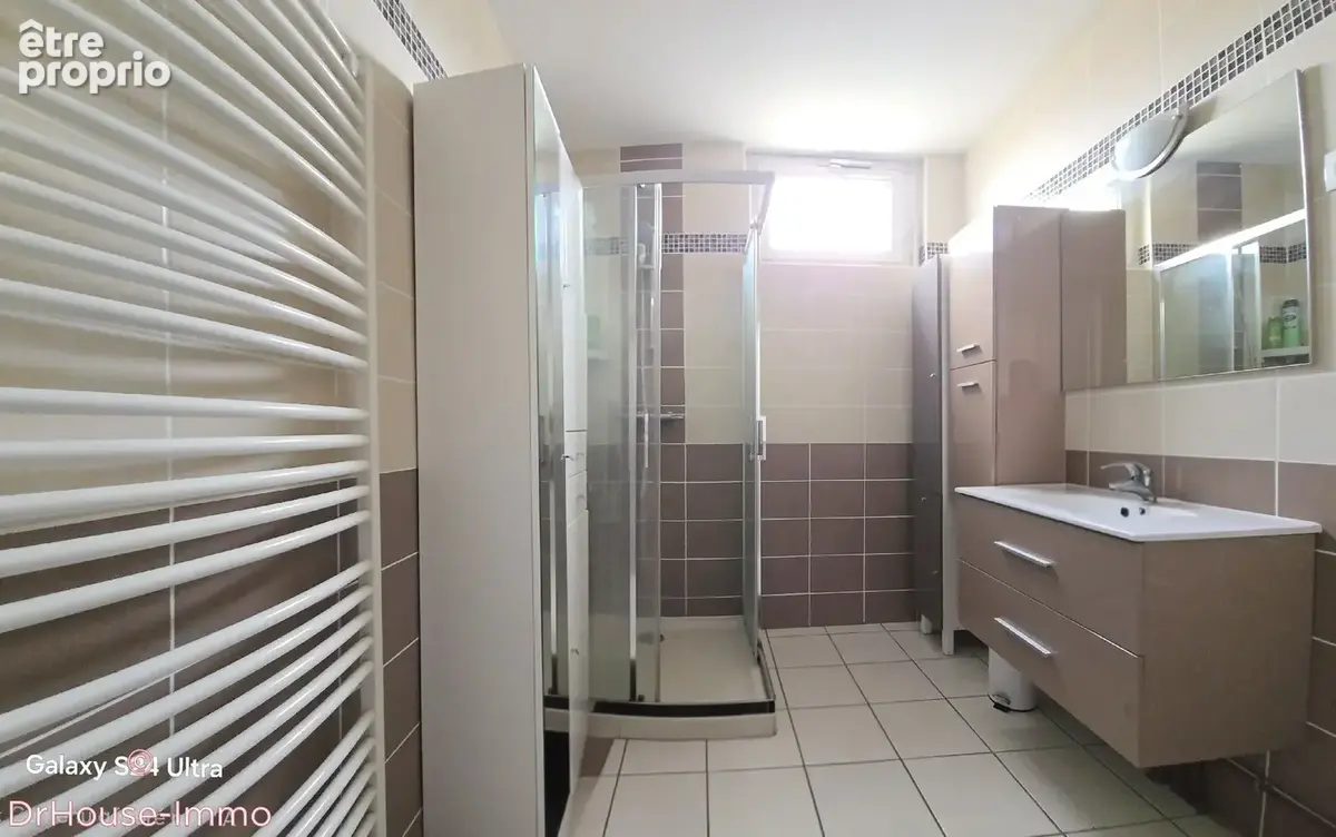 Appartement 4 pièces 85 m² à vendre à Le Chambon-Feugerolles (42500) - photo 7