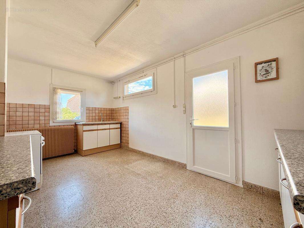 Maison plain-pied, 103 m², deux chambres - Terrain de 1293 m² - photo 9