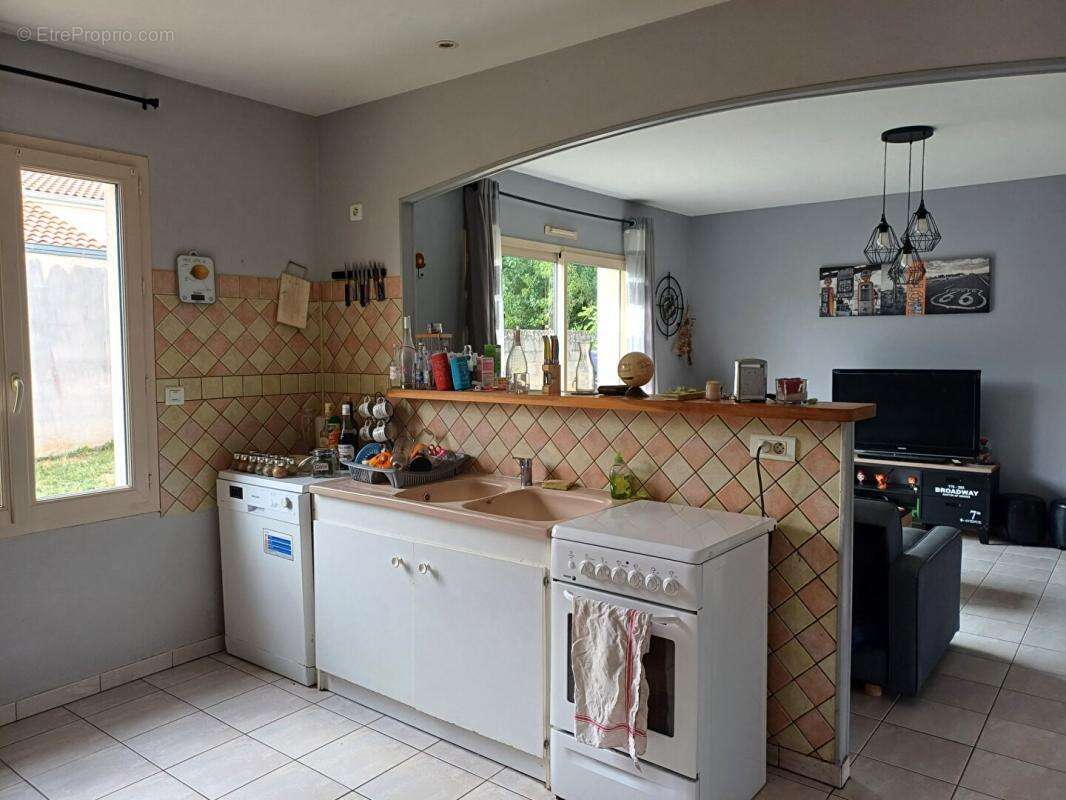 Maison à VOUILLE