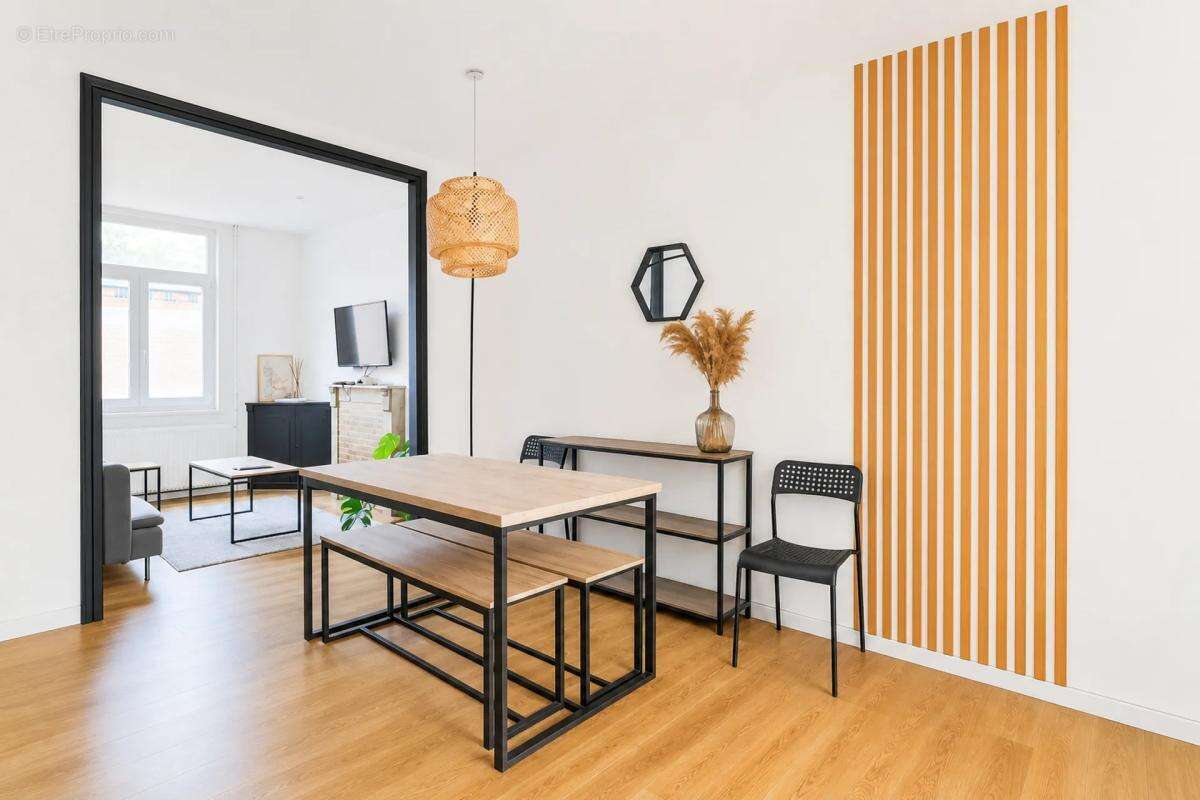 Maison louée 5 pièces 97 m² à Tourcoing - photo 5
