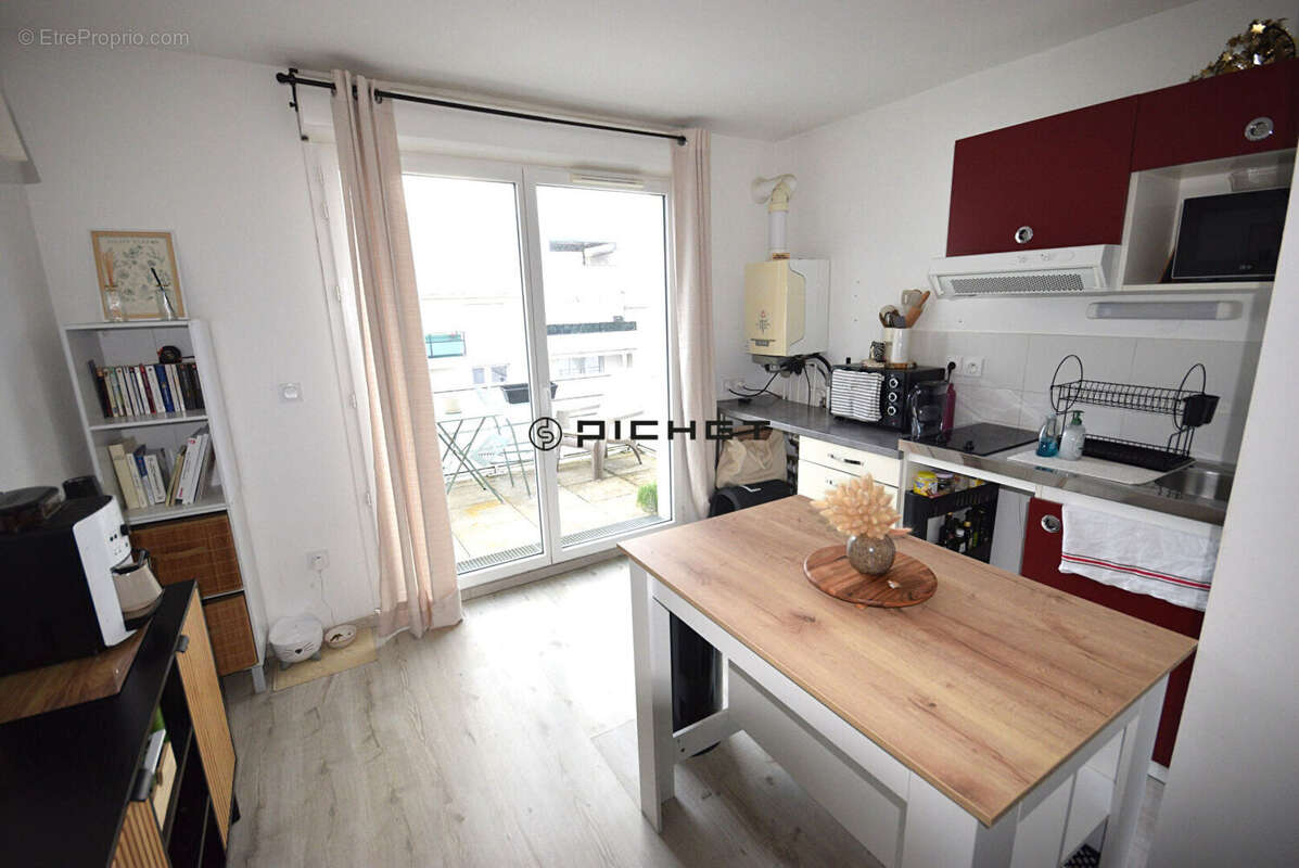 Appartement T2 avec ascenseur ,terrasse et parking sous-sol - photo 2