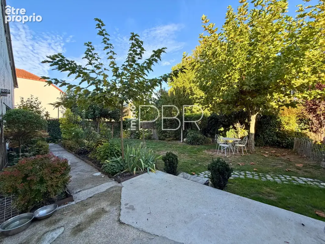 Maison T5 avec jardin et garage - photo 3