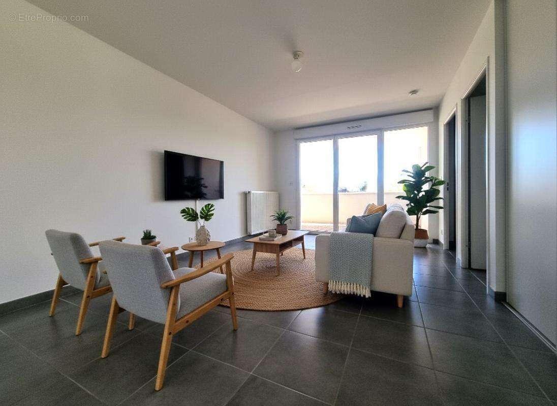 Appartement à BEAUZELLE