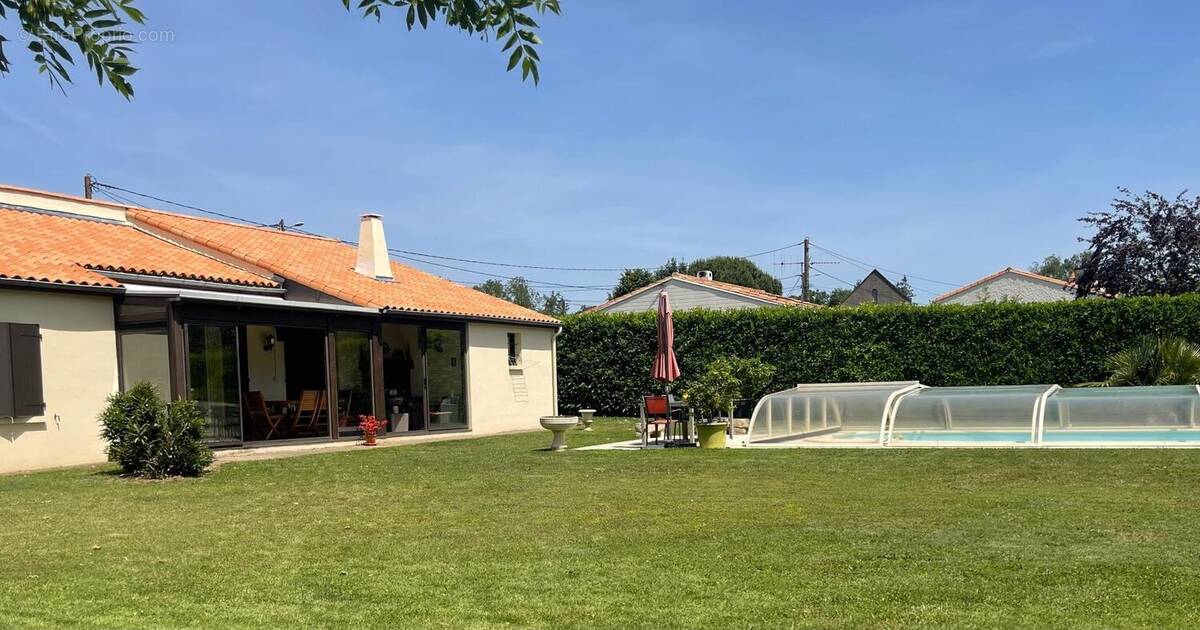 Photo 1 - Maison à VOUILLE