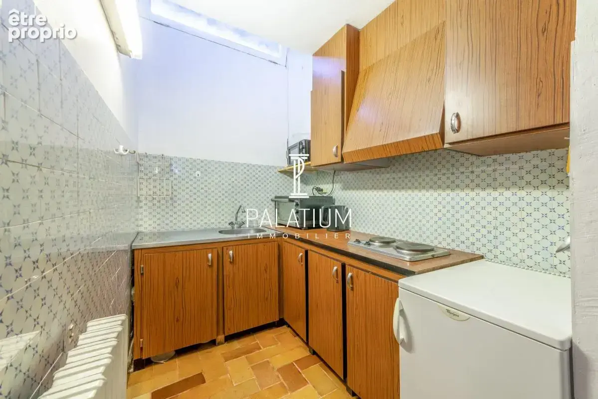 Maison de plain-pied avec jardin arboré et 3 appartements - photo 20