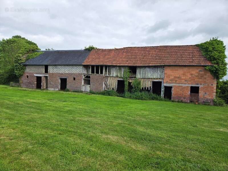 Terrain de 1750 M2 constructible à Duranville avec un grand bâtiment à rénover - photo 3