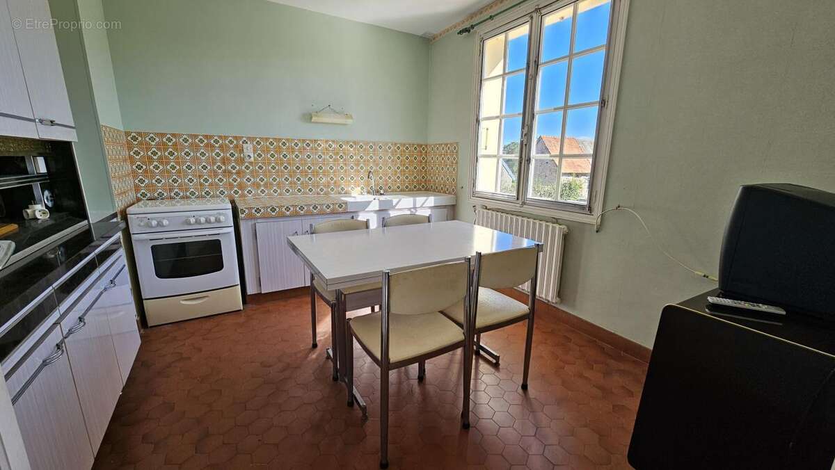 Maison à CAVIGNY