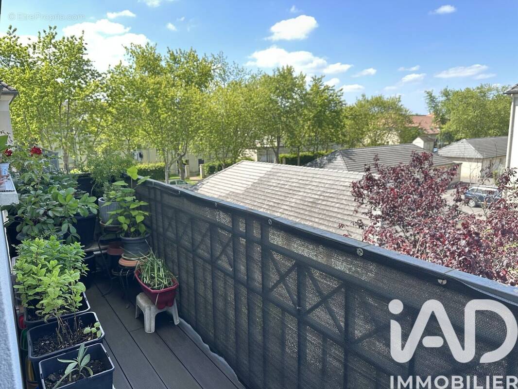 Photo 1 - Appartement à SAVIGNY-LE-TEMPLE
