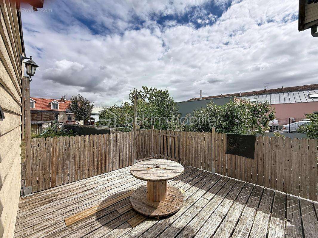 Maison familiale de 103 m² avec 4 chambres, jardin clos et sous-sol complet - photo 7