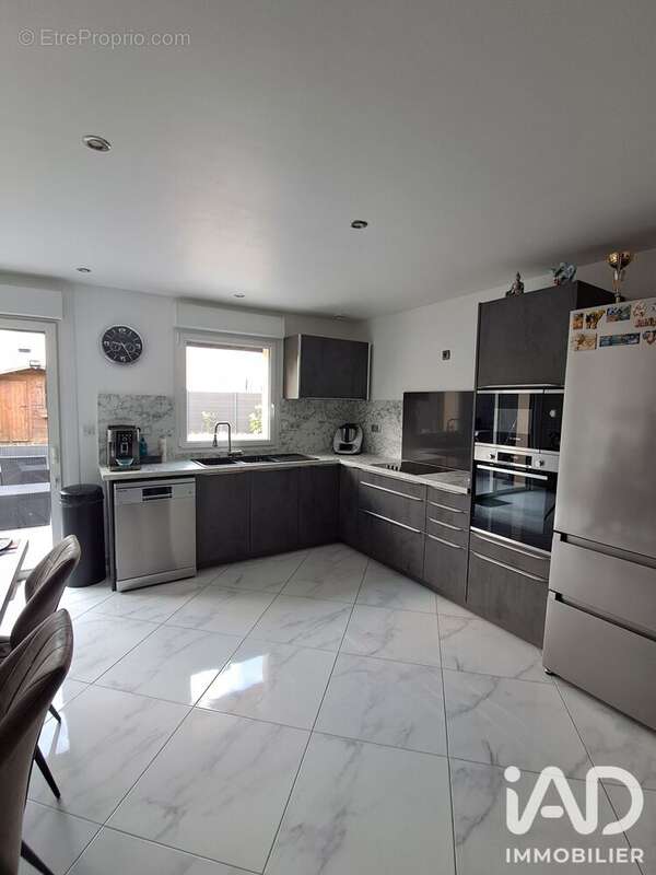 Maison 88 m² à Courcelles-Les-Lens  - photo 2