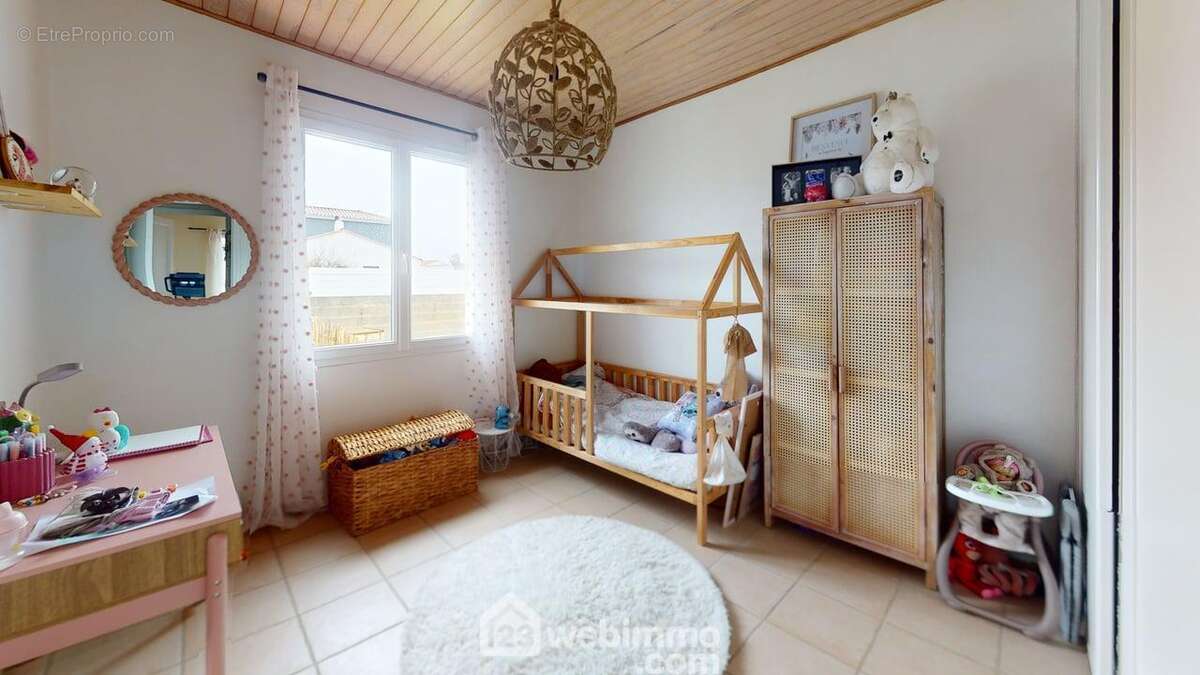 La seconde chambre enfant de 11m2. - Maison à SAINT-VINCENT-SUR-JARD