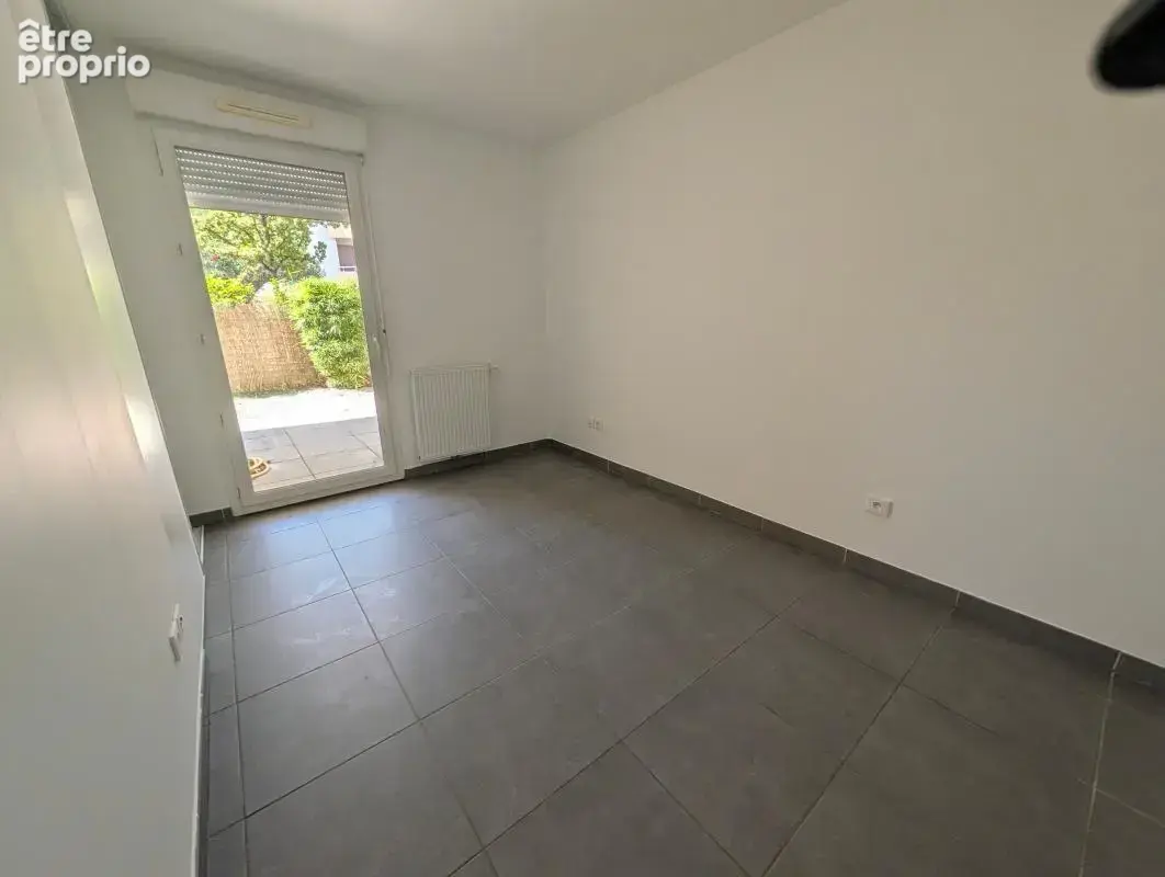 Appartement T3 RDJ avec parking centre ville au calme - photo 10