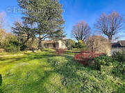 Maison à SAINT-GENIS-LES-OLLIERES