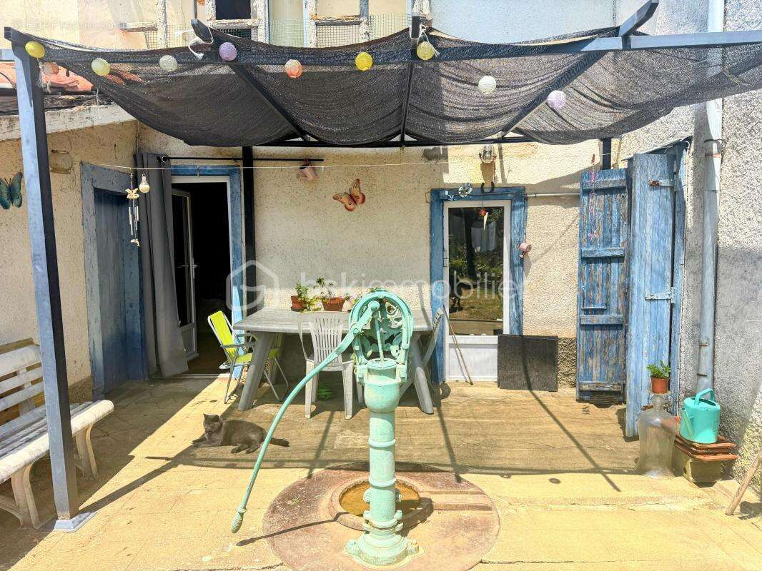 Maison mitoyenne de caractère avec un beau terrain et un garage - photo 2