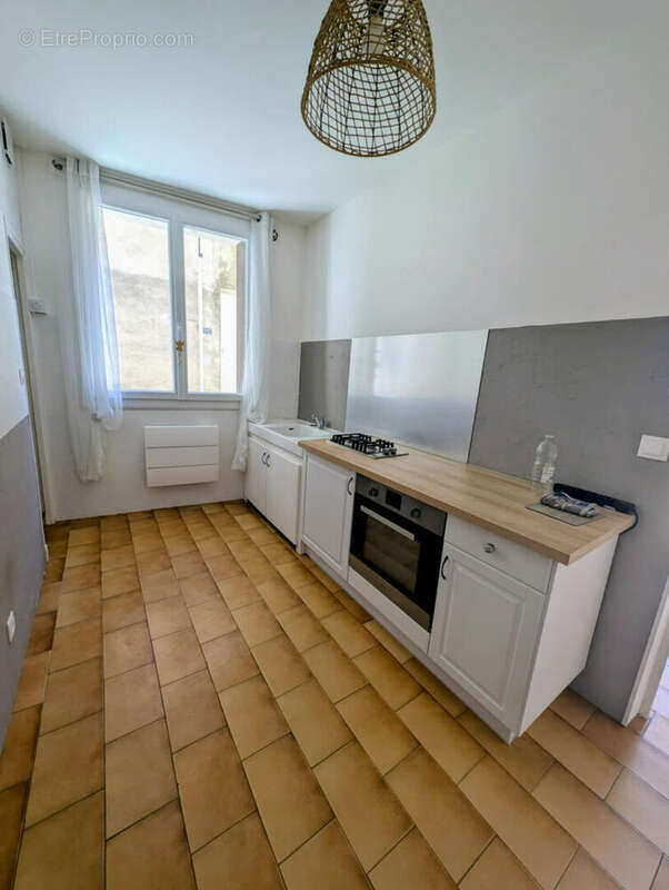 Maison à LAUDUN-L&#039;ARDOISE