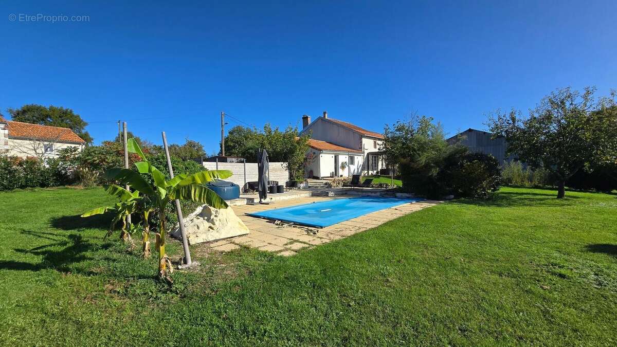 Photo 2 - Maison à LATHUS-SAINT-REMY