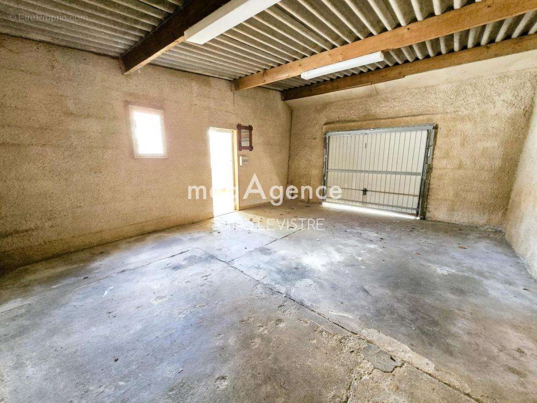 maison de 5 pièces de 122m² - photo 9