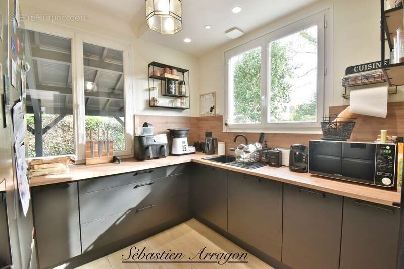 Maison plain-pied à vendre à Villeneuve-sur-Lot (47)– Maison rénovée avec jardin, proche commerces, idéale retraité ou couple - photo 4