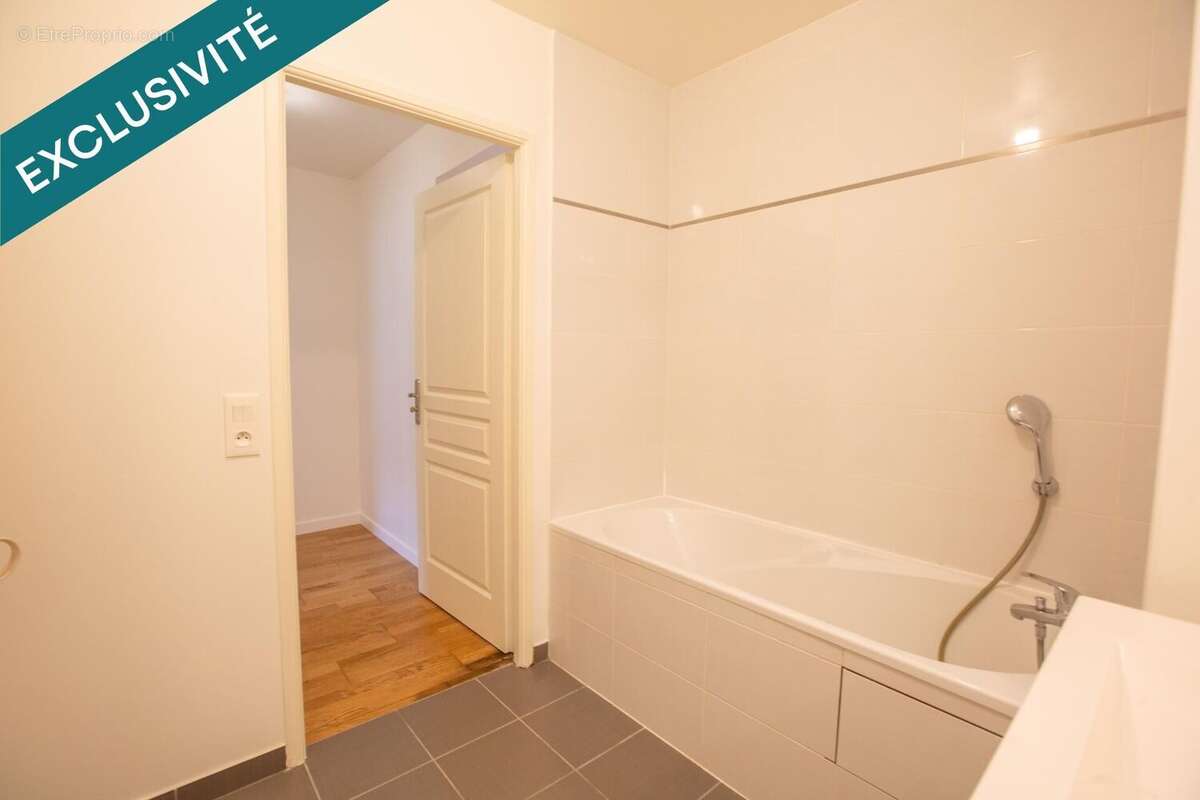 Photo 9 - Appartement à VOISINS-LE-BRETONNEUX