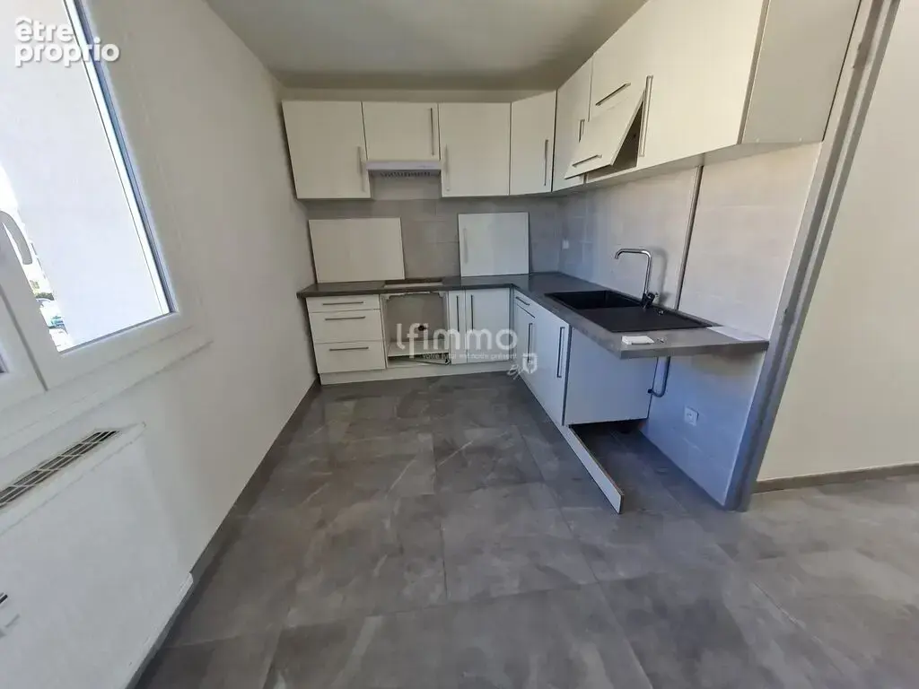 Appartement 68m² rénové avec balcon et cave - photo 4