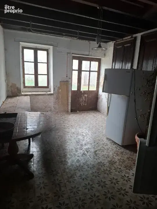 Maison a renover avec garage et terrain - photo 2