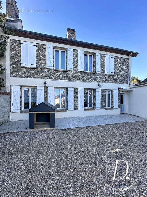 Façade avant en pierres (partie ancienne) - Maison à CIVIERES