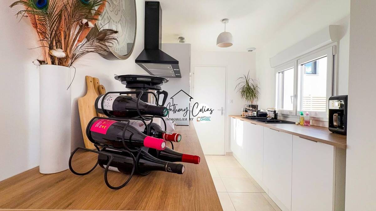 Cuisine aménagée et équipée  - Maison à NIVILLAC