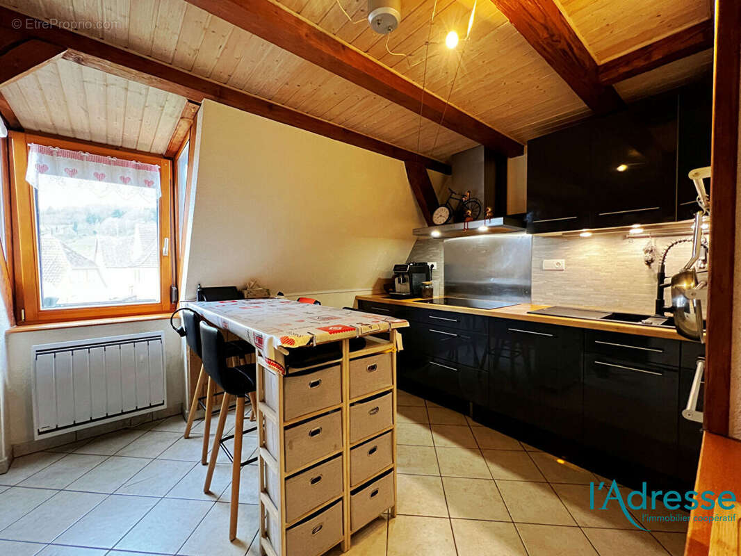 Appartement  en duplex F4 - avec stationnements et jardin - photo 6