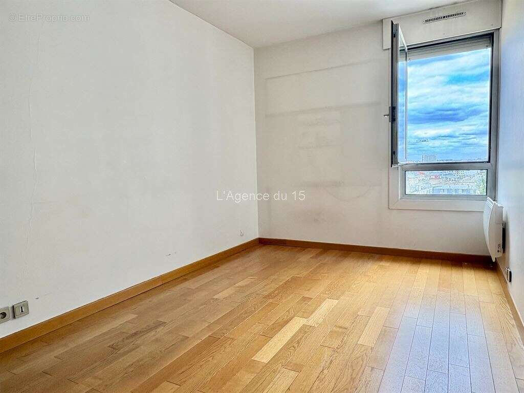 Porte de versailles / beau 2 pieces 54m² / etage eleve / ascenseur / vue degagee / cave / - photo 6