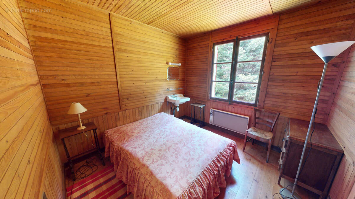 Chalet en bois sur sous sol et terrain attenant boisé - photo 12