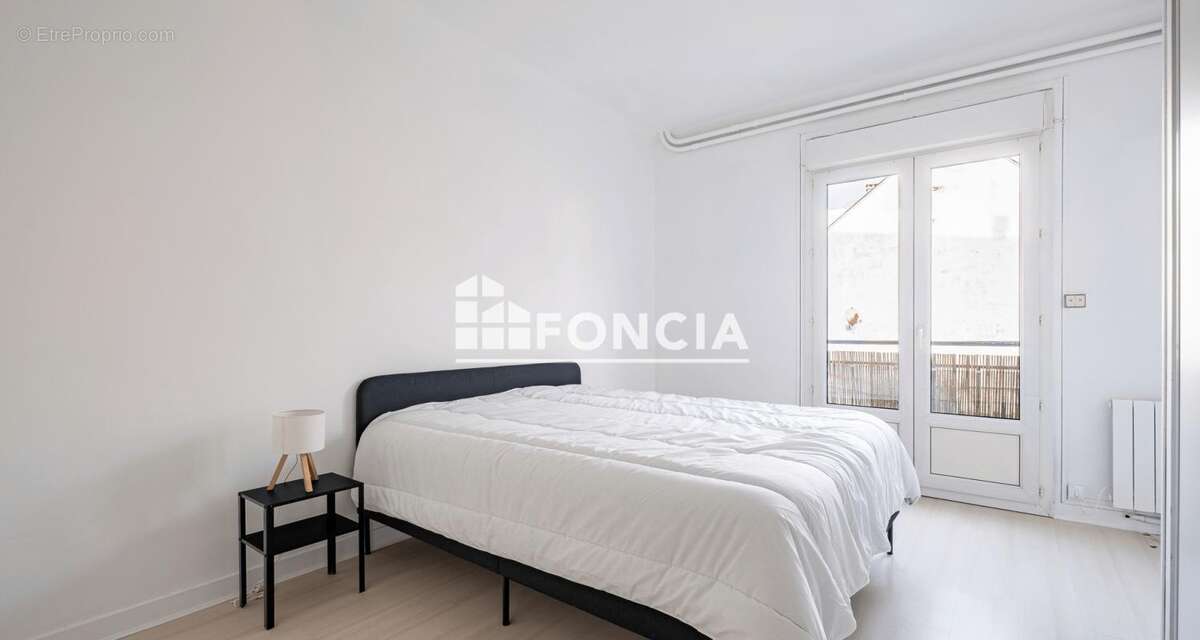 Centre ville - APPARTEMENT T3 avec balcon et caveau - photo 6