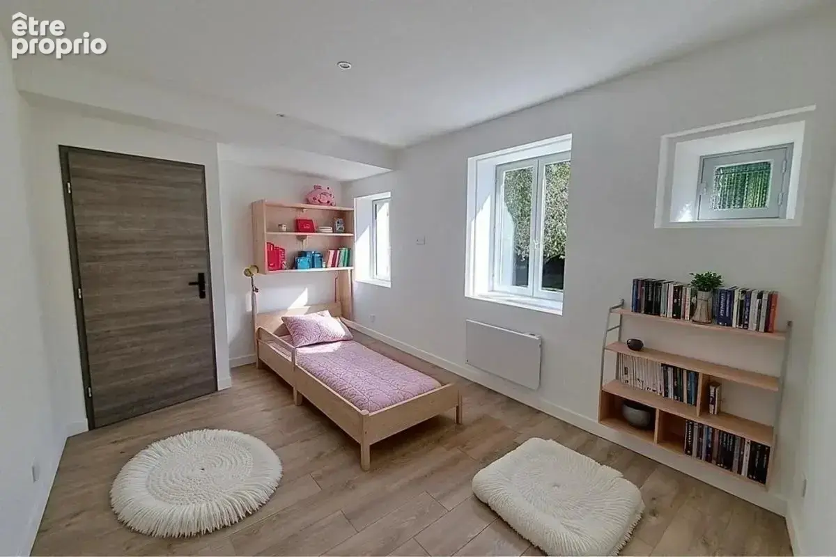 Maison 4 pièces 110 m² à vendre à Fontaines-Saint-Martin (69270) - photo 9