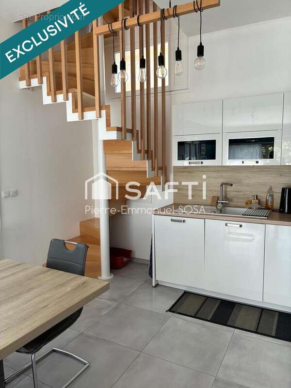 Maison 90 m² à Belmont-Luthezieu  - photo 6