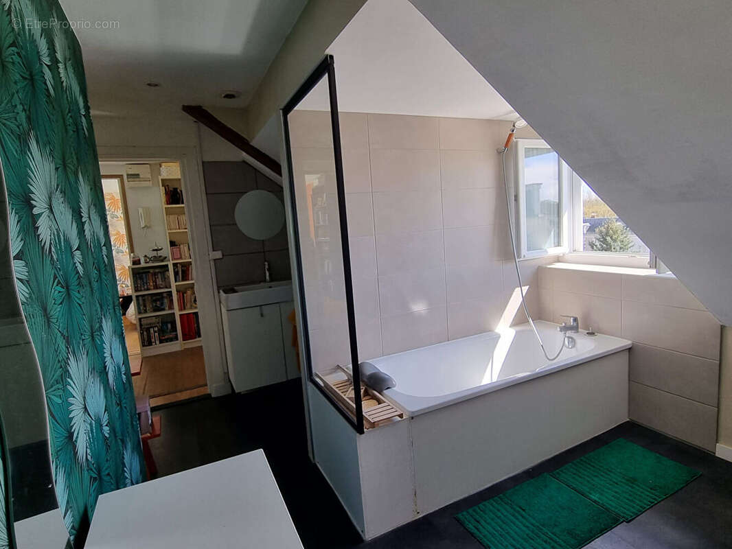 Appartement - au coeur du village - photo 13