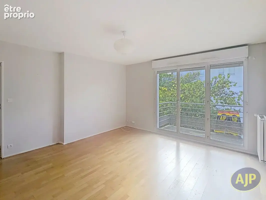 Appartement - 2 chambres - garage - cave - balcon - BEAUREGARD - photo 2