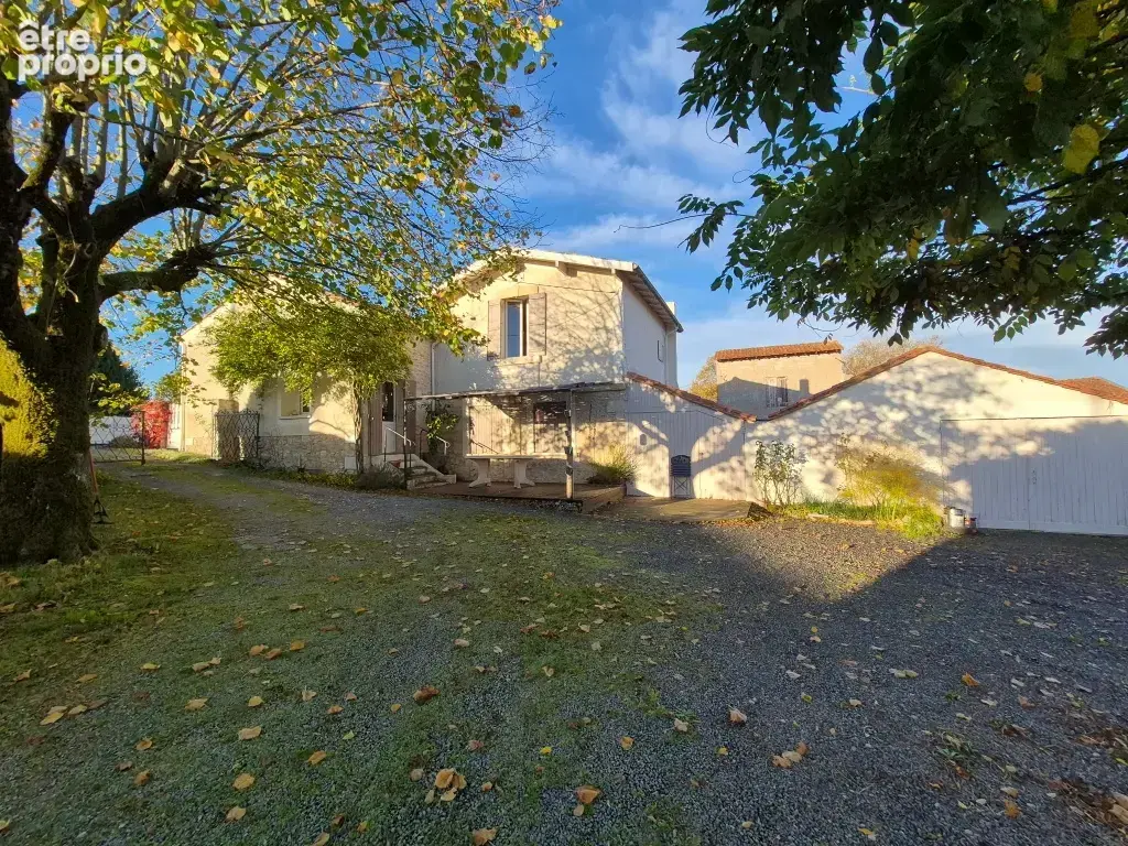 Lumlineuse maison en pierre avec grand hangar - photo 4
