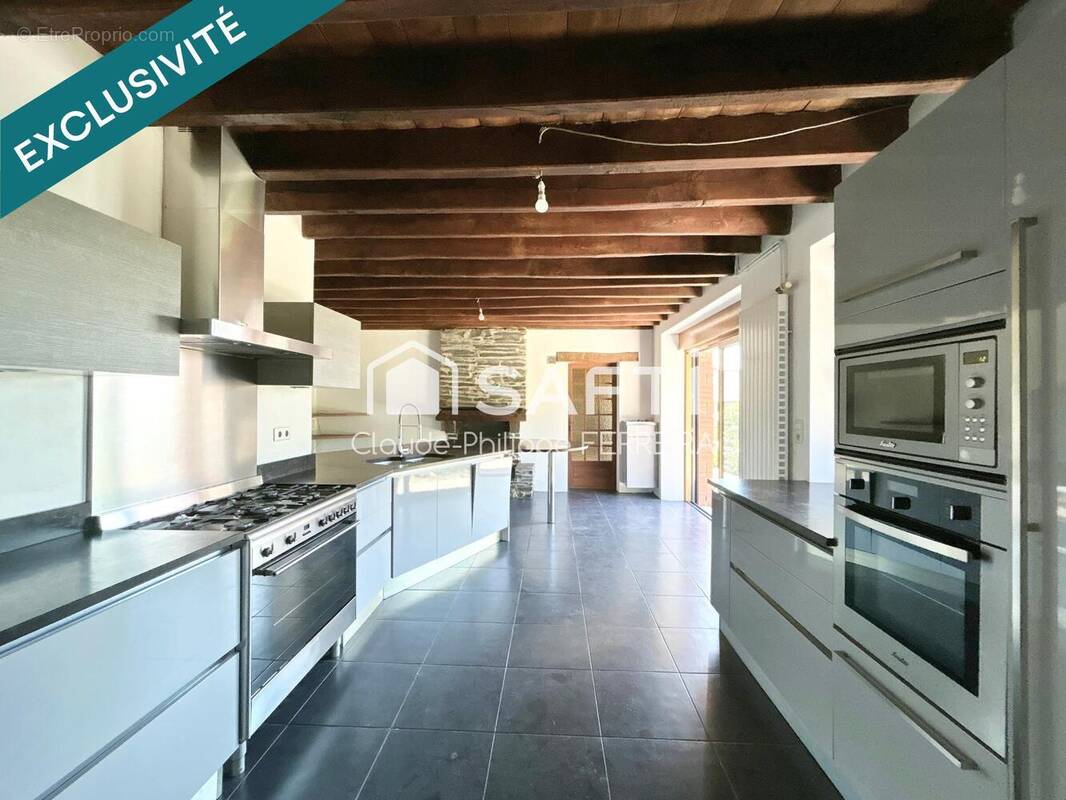 Photo 1 - Maison à GUEMENE-PENFAO