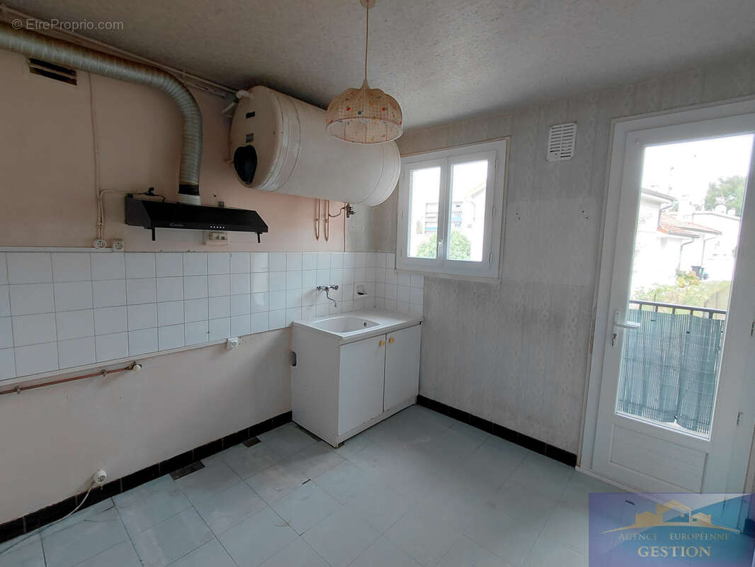 Appartement de type 4 avec cave et garage - photo 3