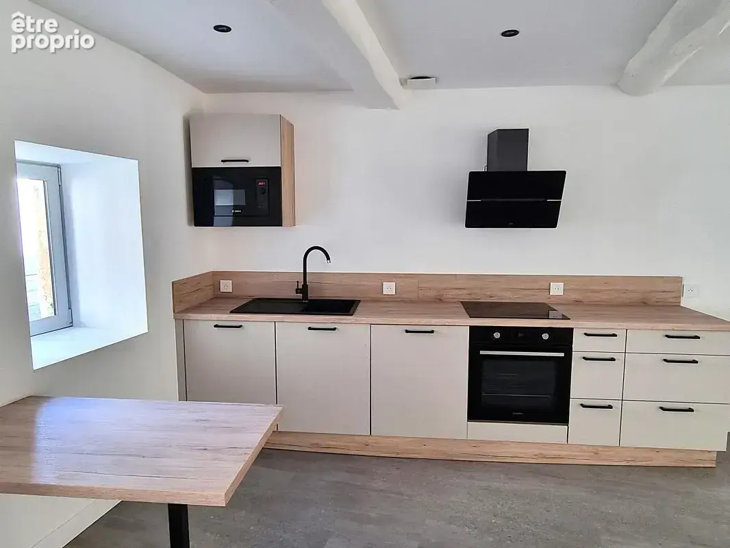 Maison 4 pièces 110 m² à vendre à Fontaines-Saint-Martin (69270) - photo 7