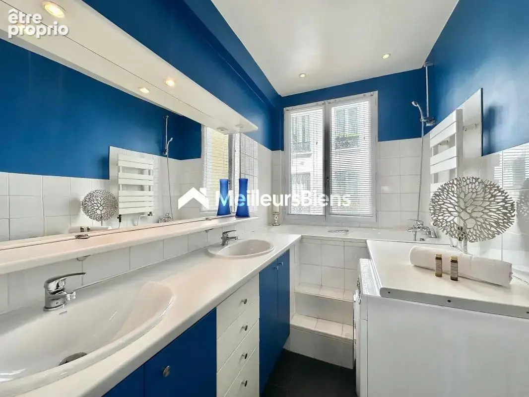 Appartement haussmannien 111 m² 5 pièces avec ascenseur Paris 9e - photo 10