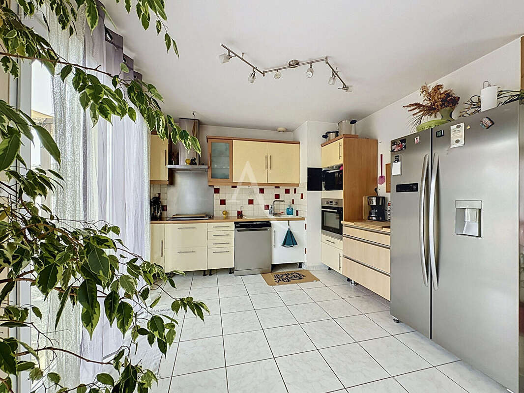 Maison Cantenay Epinard 5 pièce(s) 99.42 m2 - photo 2