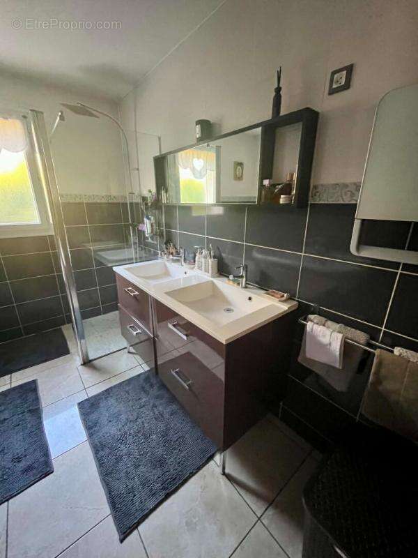 Maison plain-pied 4 chambres 120 m2 - photo 14