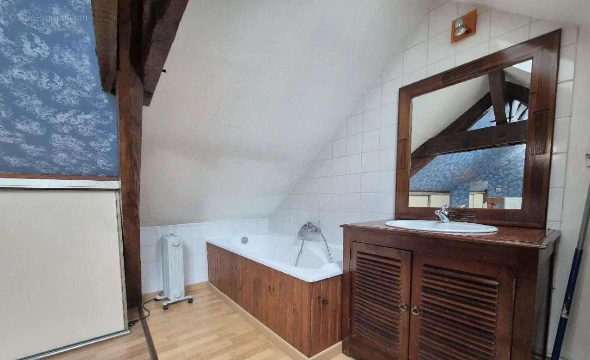 Maison à BAULNE