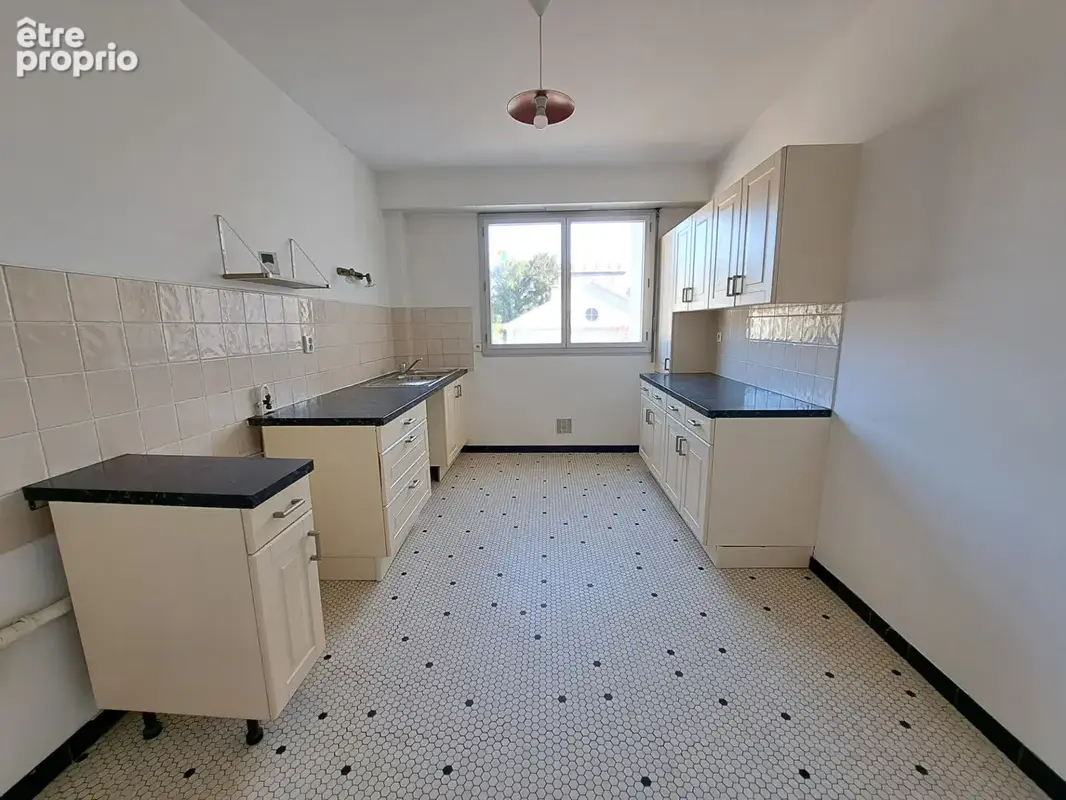 Spacieux appartement T4 de 100,97 m² avec balcon, cave et parking - photo 13