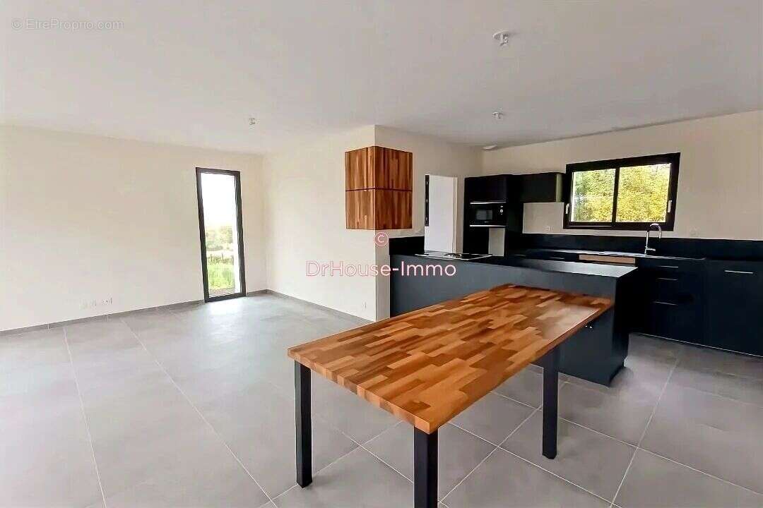 Maison à GAN
