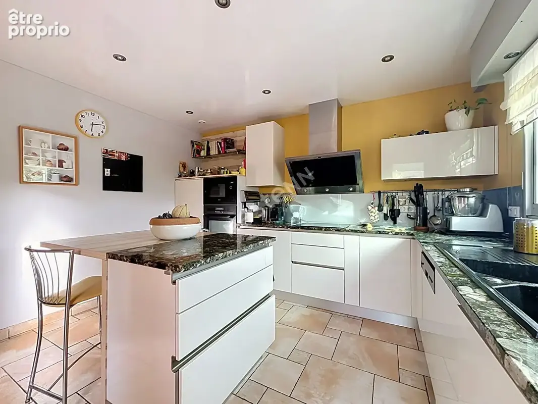 Maison plain pied 7 pièces à vendre à Rezé - La Houssais, 134 m², 3 chambres + mezzanine - photo 8